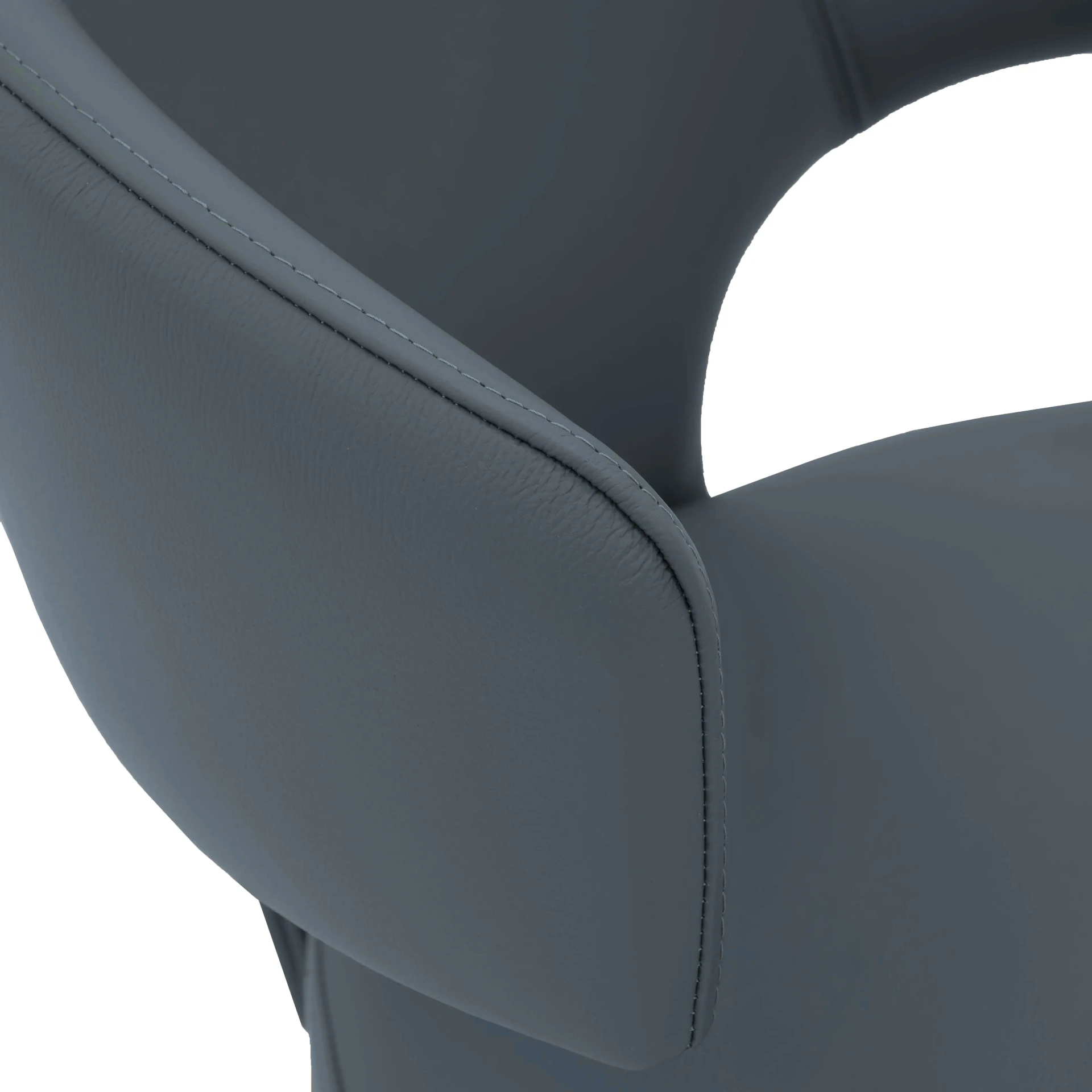 BLUE || Closeup - Close-up side view of a grey leather modern armchair featuring detailed stitching and a curved armrest.