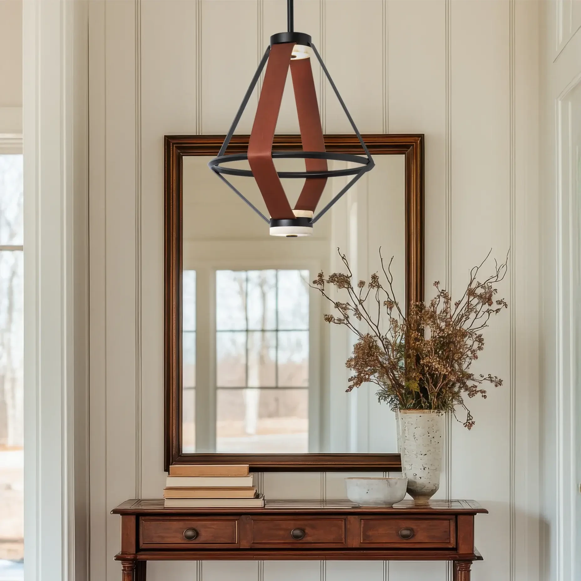 Aspen Led Small Pendant in Black Metal and Chestnut Leather with Alabaster, front view in a living room entryway.