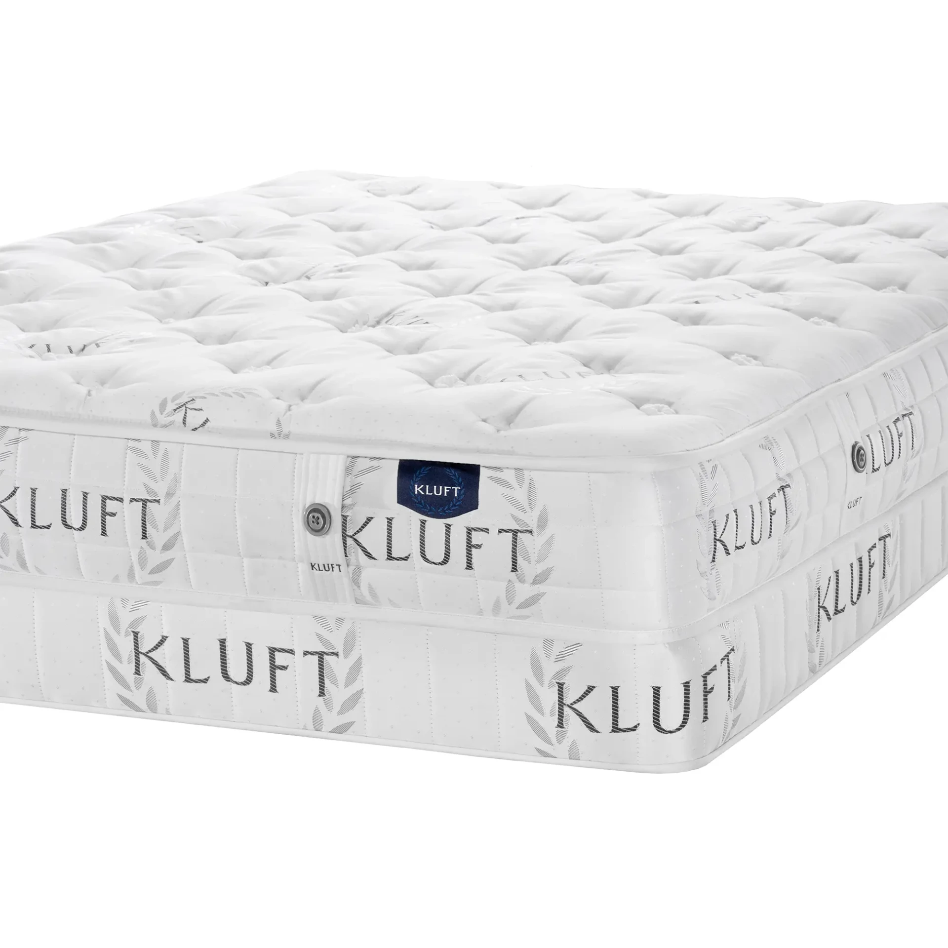 QUEEN - Kluft Baron X-firm Mattress, white quilted fabric, extra firm comfort level, three-quarter angle view.