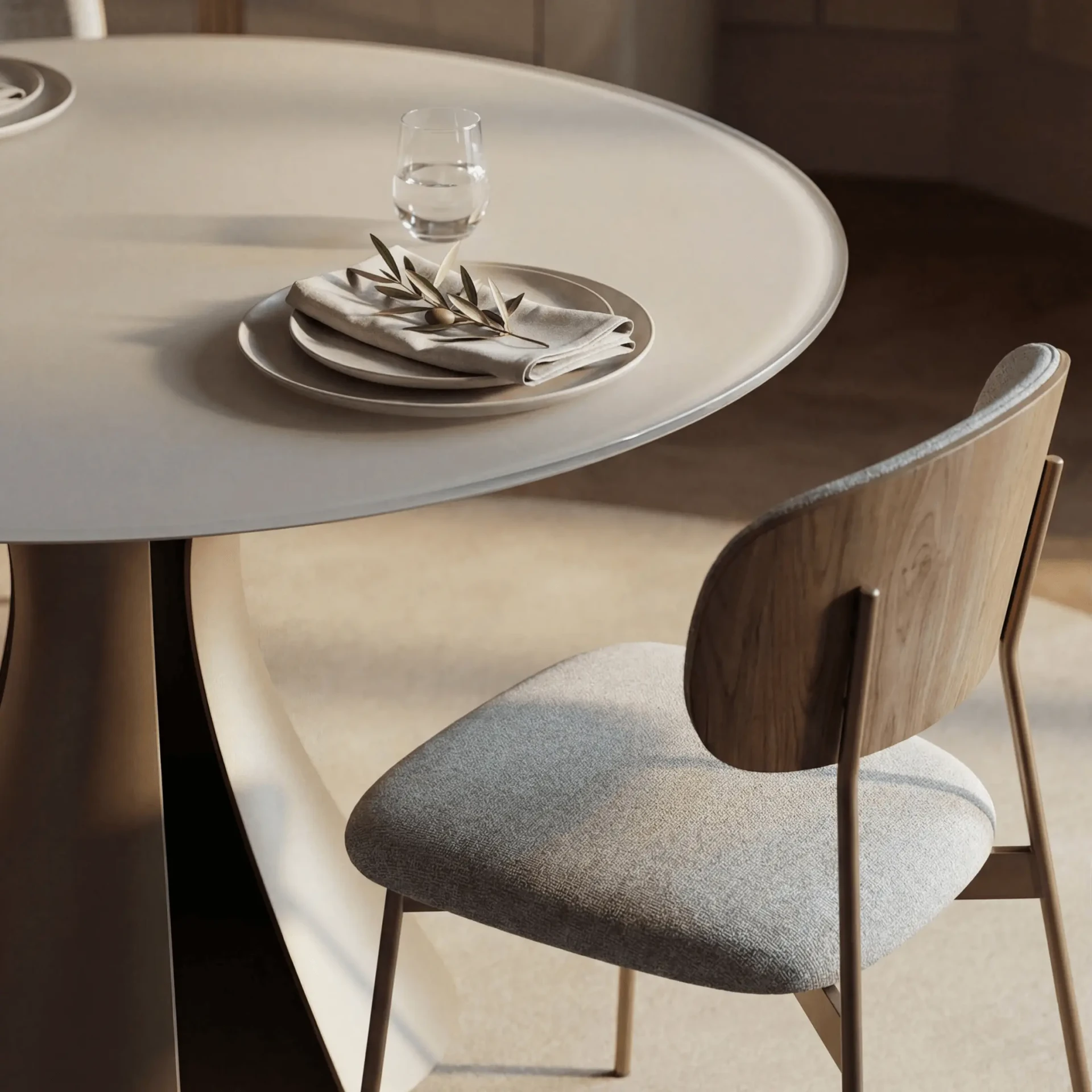 48 IN. - BDI Bloom Round Dining Table with Oyster Glass Top and Bronze Metal Base in a dining room, close-up side angle view.