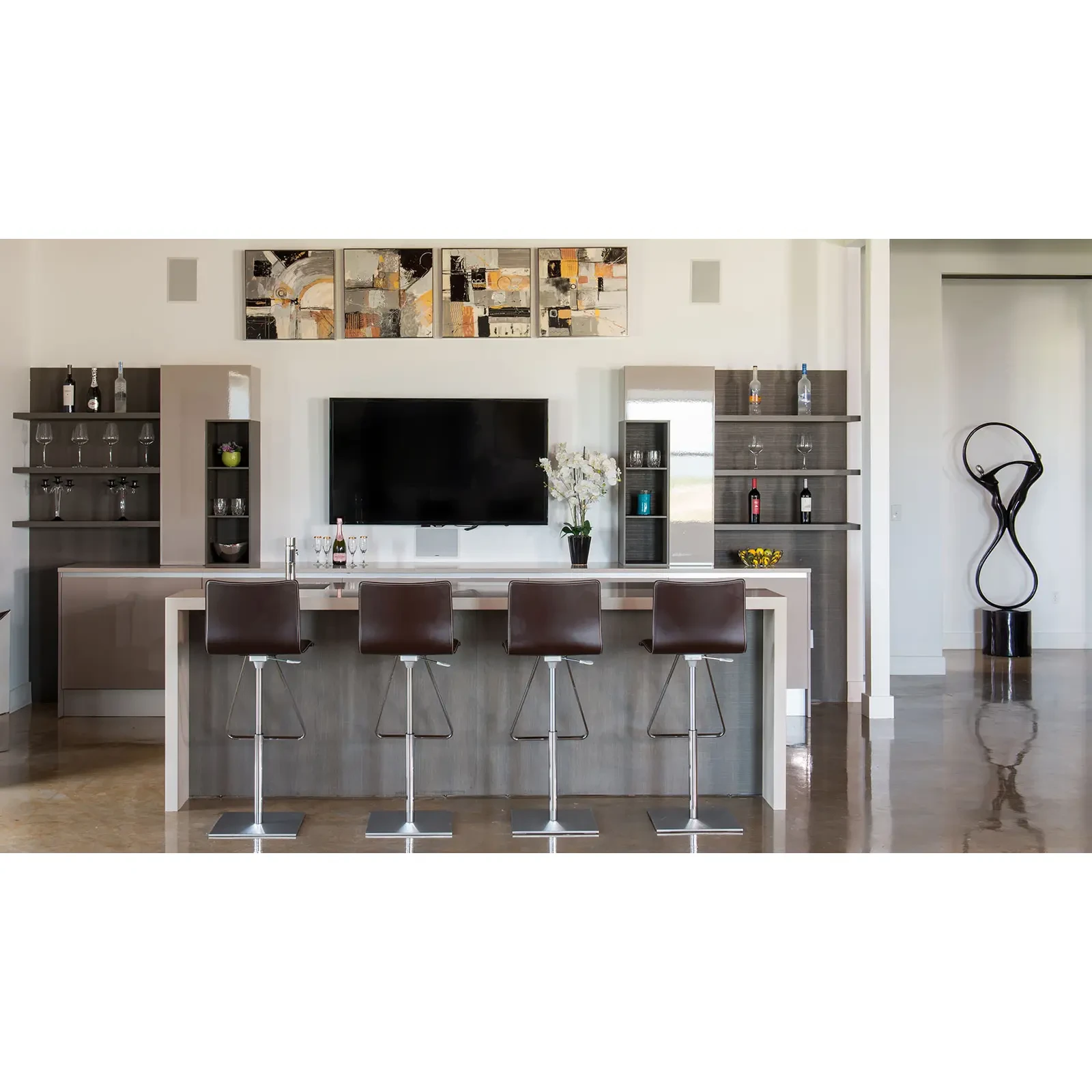 BROWN LEATHER/CHROME - Front view of four Cattelan Toto Bar Stools in Brown Leather 91 with Satin Steel Bases in a modern home bar setting.
