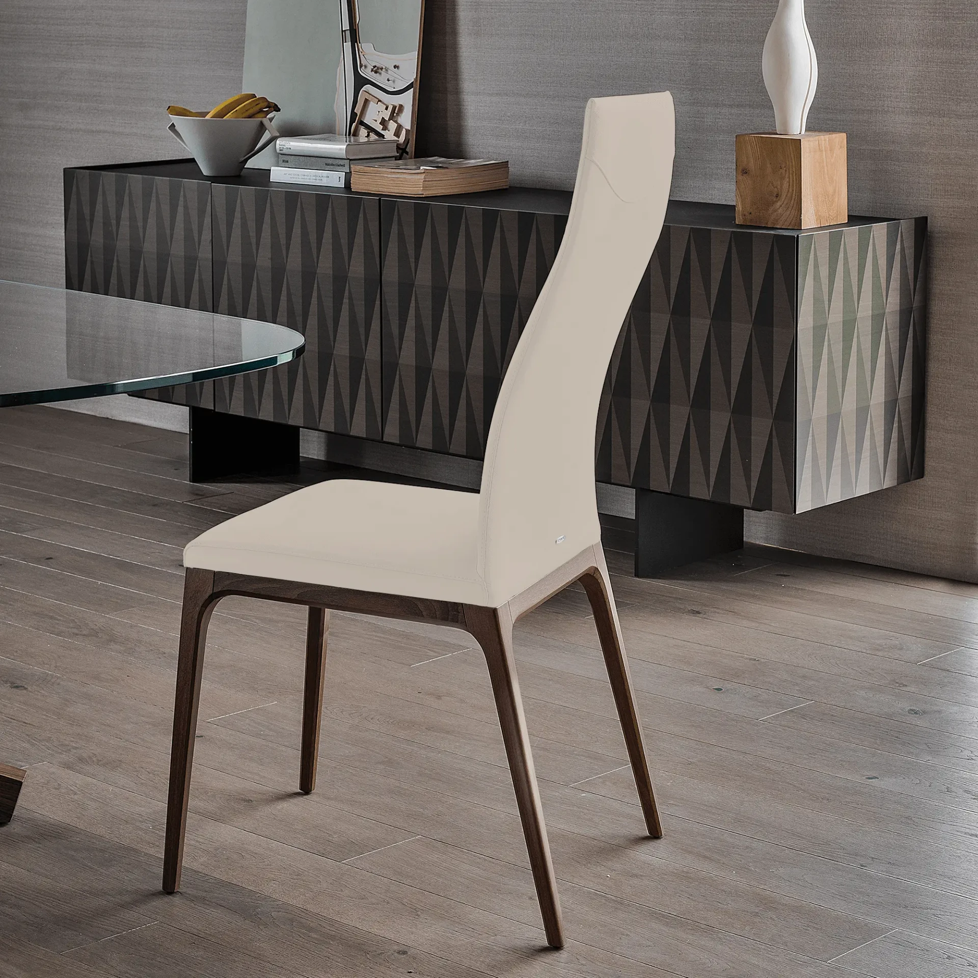 LINO || WENGHE - Cattelan Arcadia High Back Chair in Lino Soft Leather 948 and Wenghe Stained Beech Frame, side view in dining room setting.