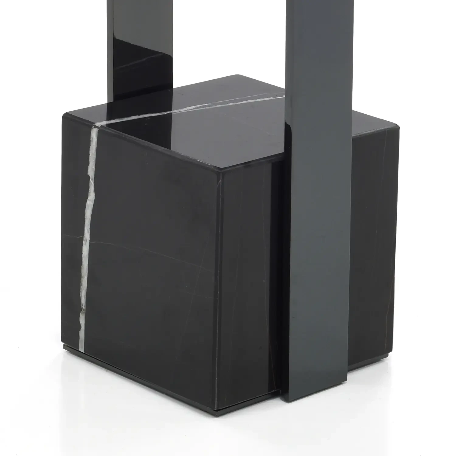 AMBER LACQUER - Malerba Black & More accent table, modern black chrome frame and marble base, close-up low angle view.