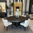 Black & More Dining Table Shown in a Dining Room Setting