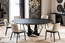 Skorpio Round Dining Table Shown in a Dining Room Setting