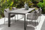 Frame Milo Extension Dining Table Shown in an Outdoor Setting