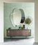 Closeup - Ulisse Mirror Shown in a Hallway Setting