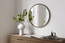 Linq Round Mirror Shown in a Bedroom Setting