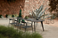 BASALT BLACK - Torsa Dining Table Shown in an Outdoor Setting