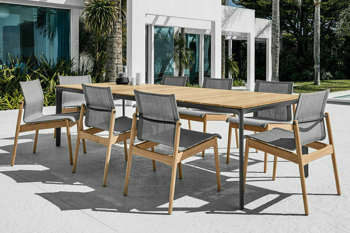 Closeup - Image courtesy of Gloster Furniture, Inc | Carver Dining Table Shown in an Outdoor Setting