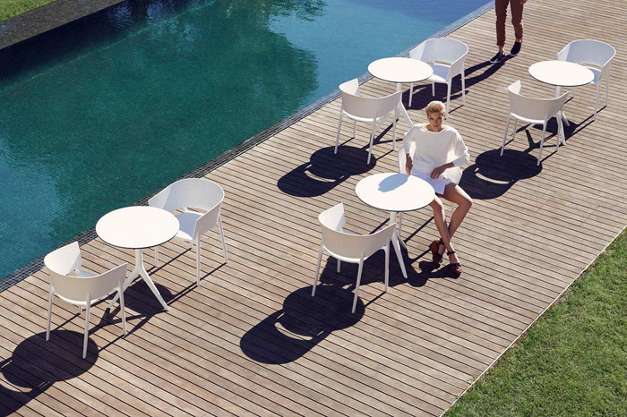 WHITE - Africa Arm Chair Shown in an Outdoor Setting