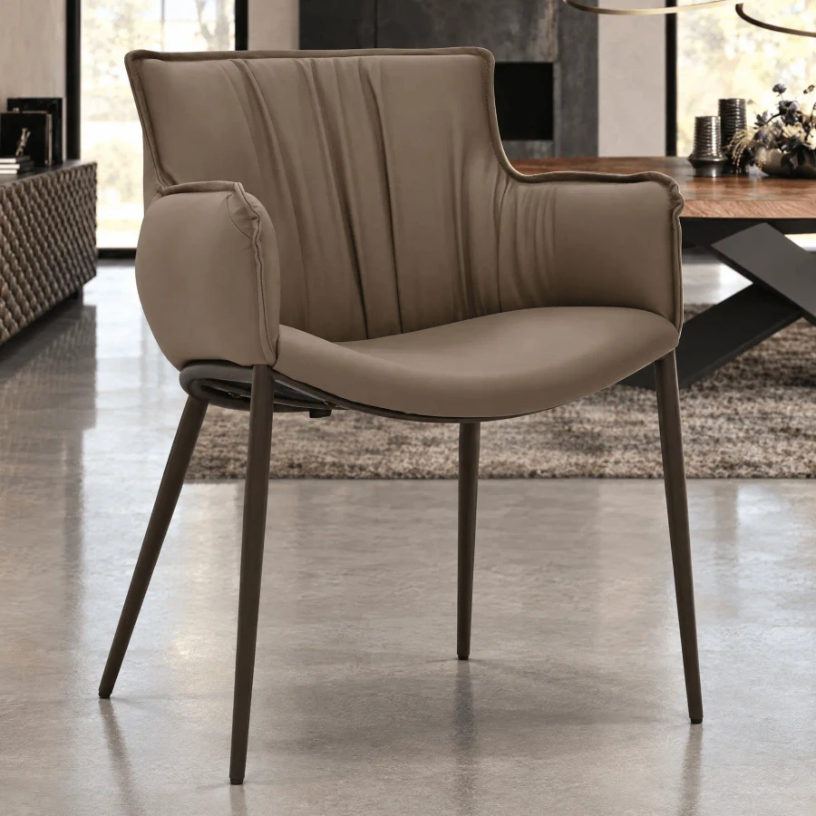 FANGO || BRONZE EMBOSSED STEEL - Cattelan Rhonda Arm Chair in Fango Soft Leather with Bronze Embossed Steel Frame, front angle view in a dining room setting.