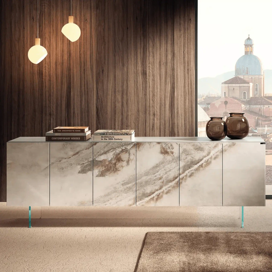 Lago 36e8 Sideboard in Alabastro polished Xglass, tortora lacquer frame, clear glass legs, front view in living room setting.