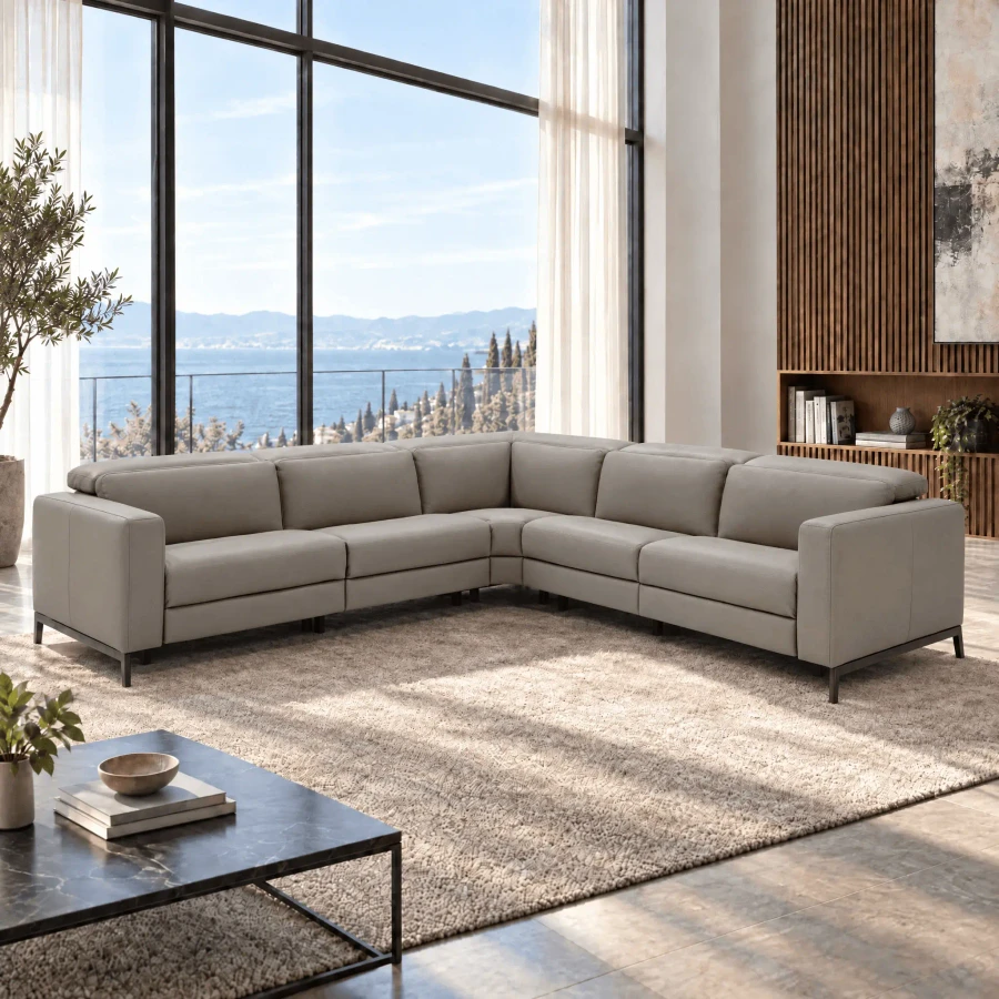 Valenza Power Sofa, modern L-shaped sectional in taupe leather with antique bronze legs, living room, front angle view.