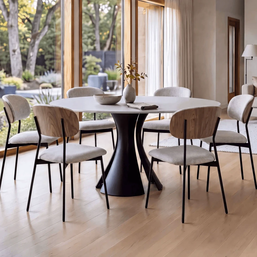 BDI Bloom 60 In Round Dining Table, Oyster Glass Top, Black Metal Base, modern style, dining room, angled view.