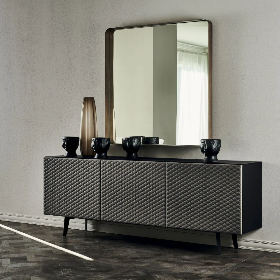Cattelan Absolut Sideboard in living room, black soft leather tufted doors, embossed wood case, front view.