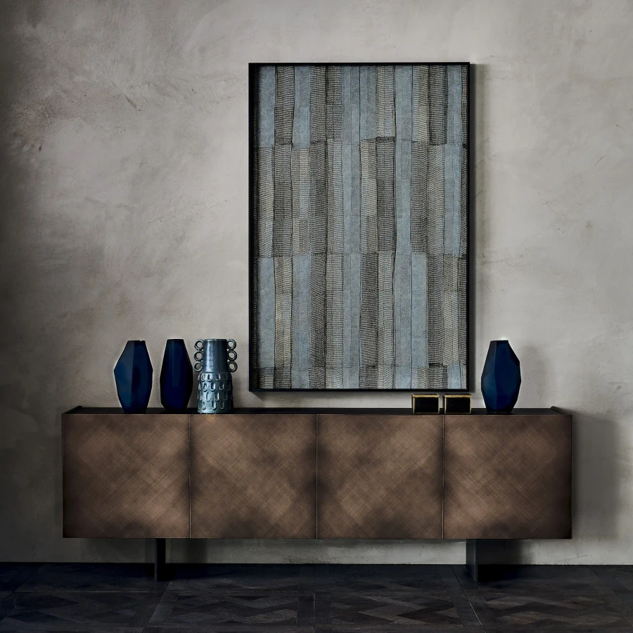 BRUSHED BRONZE - Cattelan Arizona Sideboard in living room, brushed bronze doors, black embossed steel feet, front view lifestyle shot.