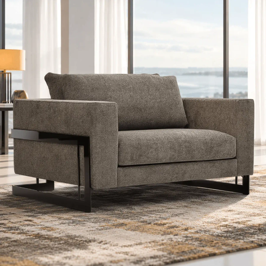 Malerba Perfect Time Arm Chair, modern grey textured fabric, black chrome frame, side view in living room setting.