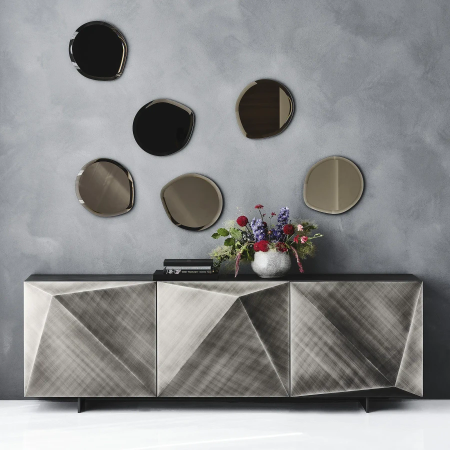 BRUSHED GREY - Cattelan Kayak 3-door Sideboard in Brushed Grey with Graphite Steel Legs, modern faceted design, front view in living room.