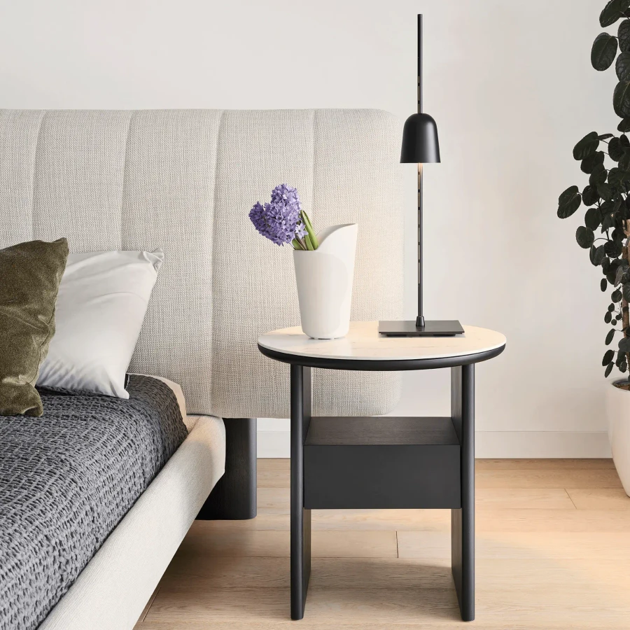 Ascent Table Lamp in black extruded aluminium and technopolymer, modern style, bedroom setting, side view.