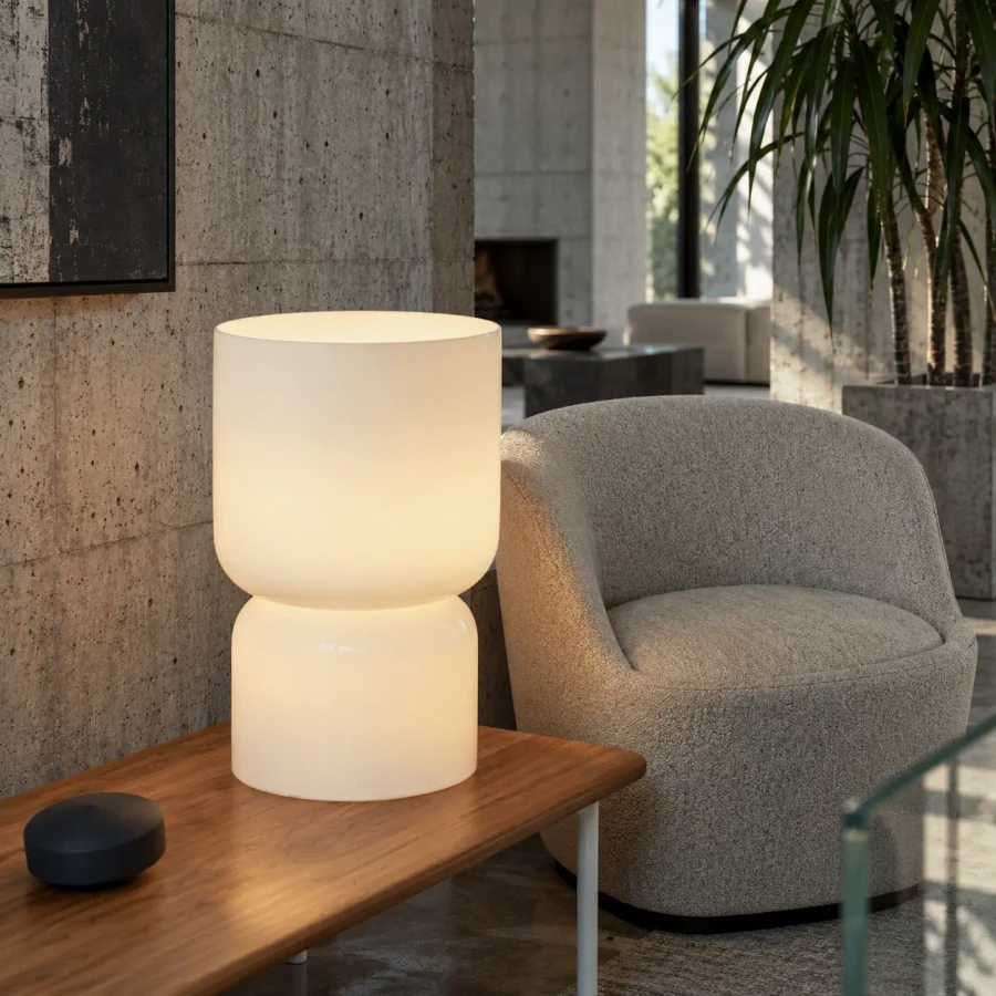 EXTRA LARGE - Pablo Totem Table Lamp in Opal Blown Glass, modern style, white, dimmable LED, eye-level view in a living room setting.