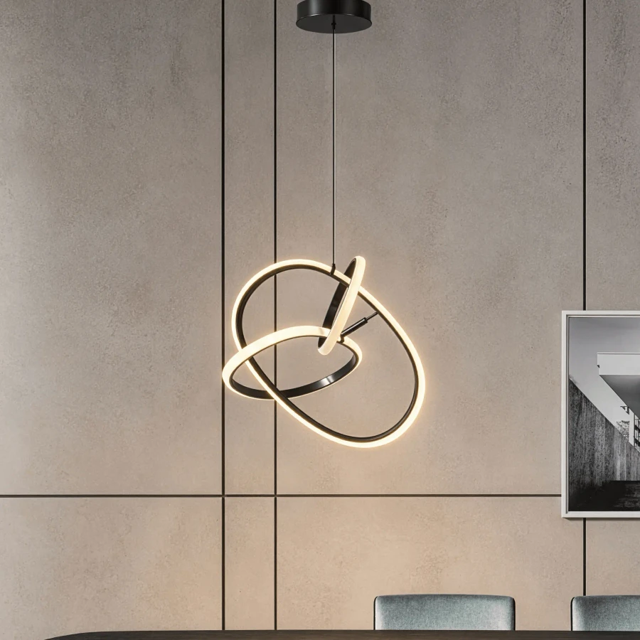BLACK - Circa Ceiling Pendant, modern black aluminum dimmable LED light, interlocking rings, front view in dining room setting.
