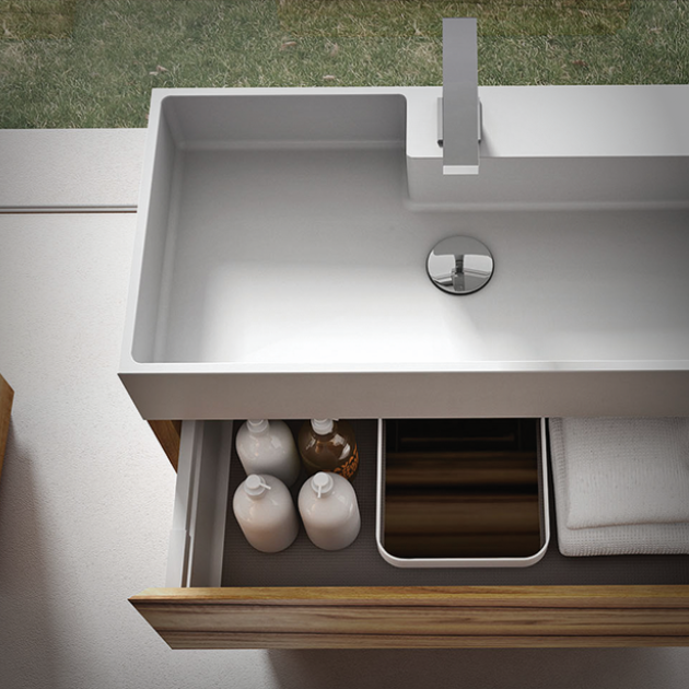 Modern bathroom sink with wood drawers