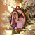 A Nativity of Christ (Whirledge) Ornament hung on a Christmas tree A Nativity of Christ (Whirledge) Ornament hung on a Christmas tree