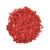 A close view of red Jerusalem Incense granules. 
