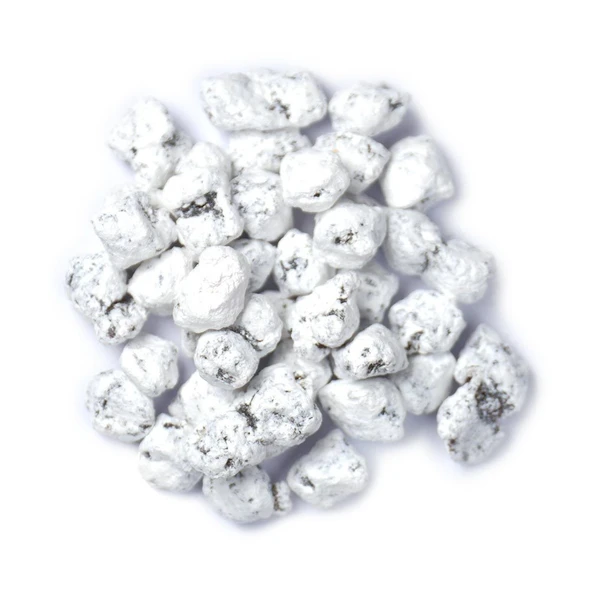 Close view of powdery white Lemon Blossom Incense. 