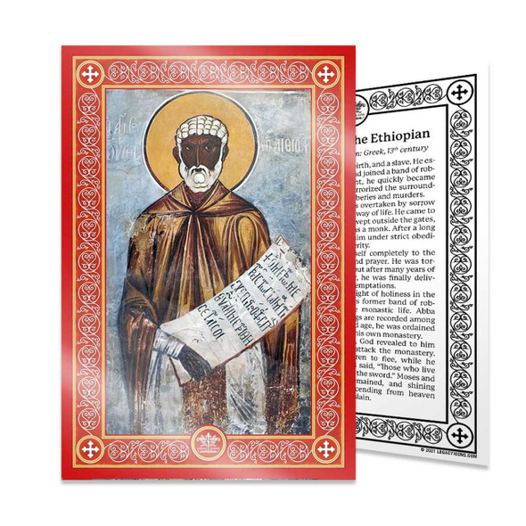 Saint Moses the Ethiopian with white beard and hair and in a dun-colored monastic habit while unfolding a scroll