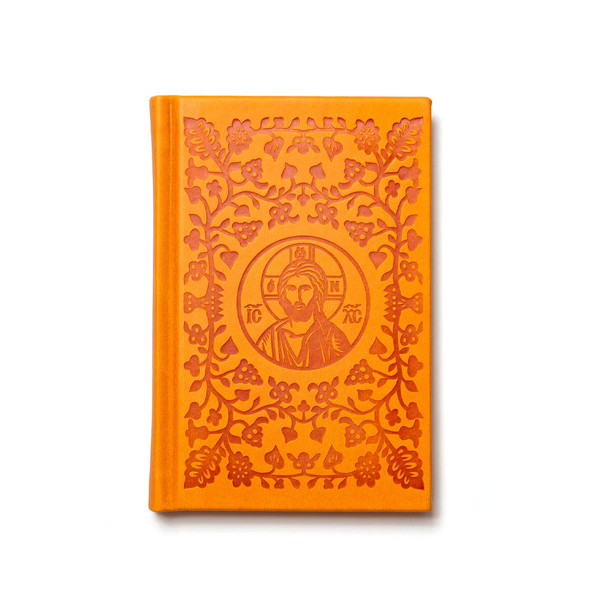 Hardcover prayer book with gold edges and ribbons, titled 'Light of the World'.