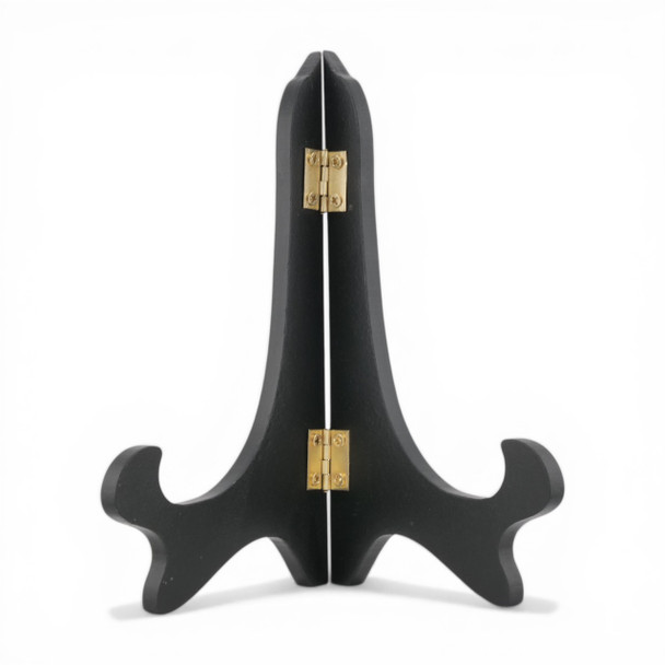 A black icon display stand with brass fittings