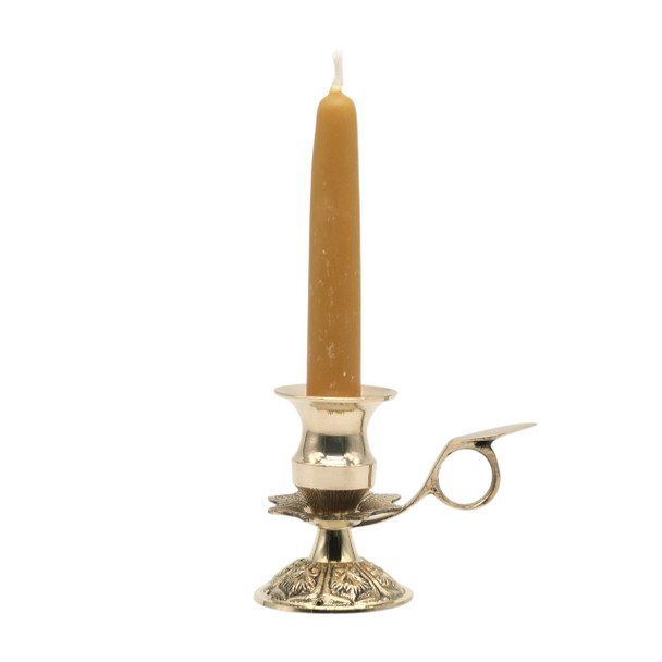 Five inch tall beeswax candle in a brass candle holder.