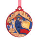 Circular ornament showing Virgin Mary lying beside baby Jesus in a manger, both with golden halos.