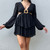 Black long sleeve tie back dress