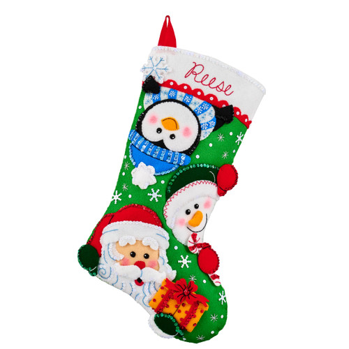 Felt Christmas stocking featuring Santa, snowmen, and a penguin on a green background