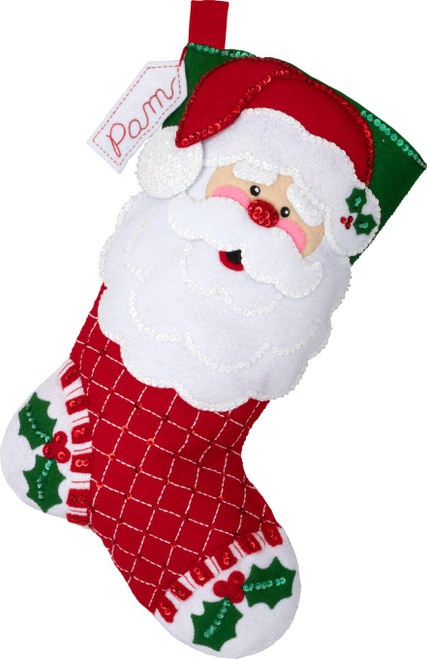 Bucilla Santa Portrait Felt Stocking Kit with red and white felt, sequins, and Santa’s face on the cuff.