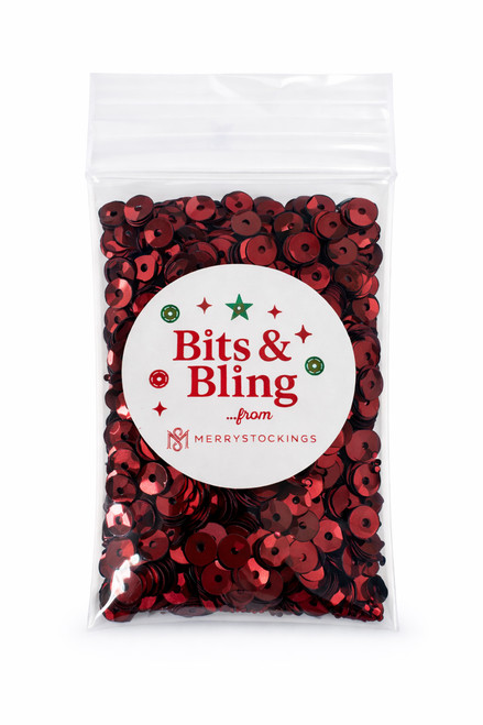 Ruby red cupped craft sequins in clear bag with Bits & Bling from MerryStockings label