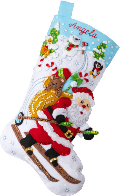 Santa’s Alpine Fun felt stocking kit with Santa skiing, polar bear, penguin, and snowy mountain scene