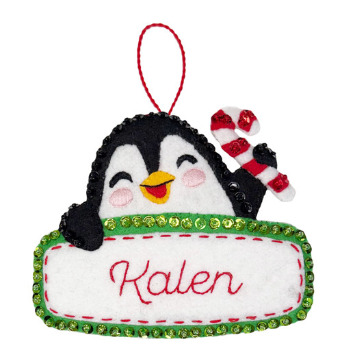 Premium personalized penguin felt name tag ornament with embroidered name and festive detailing