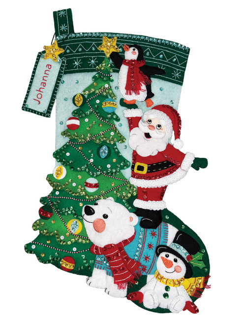 Star Bright Felt Christmas Stocking Kit with Santa and friends placing a star on top of a Christmas tree
