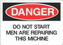 Danger Sign - Do Not Start Men are Preparing This Machine