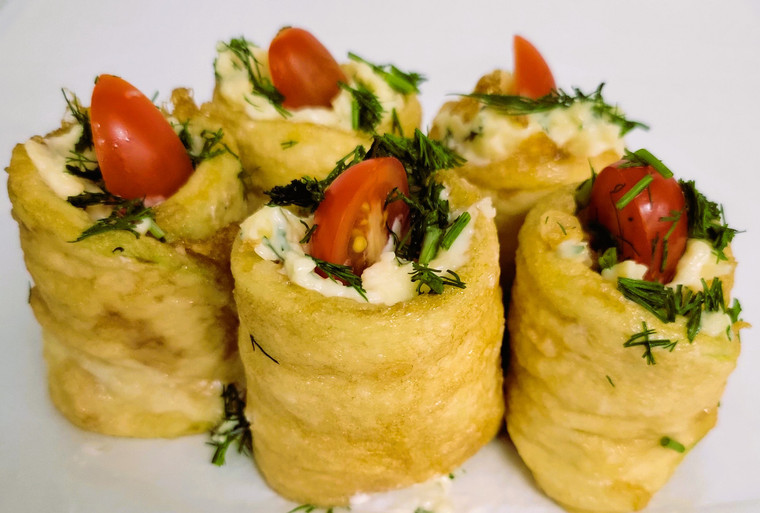 Zucchini Rolls With Cheese & Garlic, $8.99  LB