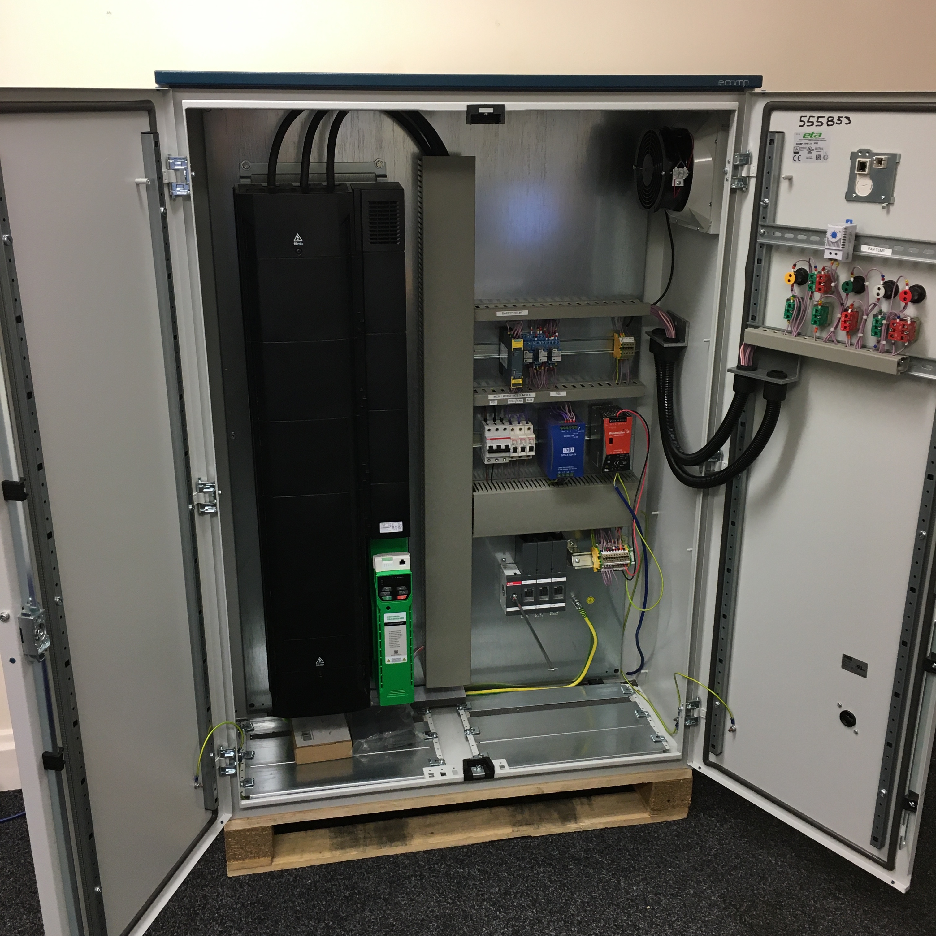 Axxa made system controls variable frequency drive, picture the whole panel from inside