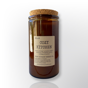 Handcrafted by Farm Kitchen Candle Co. Cozy Kitchen scented pure soy candle in a tall amber apothecary jar with a cork top. Handcrafted by Farm Kitchen Candle Co. Cozy Kitchen scented pure soy candle in a tall amber apothecary jar with a cork top.