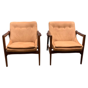 Front image of a Pair of lounge chairs, Lounge chair, leather lounge chair, Mid Century lounge chair, designer lounge chair