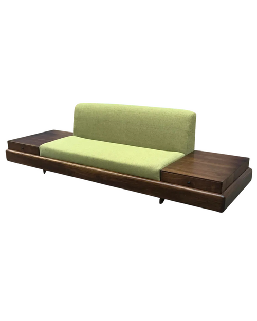 Solid walnut sofa with sleek platform base and minimalist silhouette, newly upholstered in green fabric