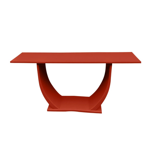 Front-facing view of red console with lacquered finish, emphasizing architectural design.
