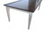 Angled shot capturing sculpted legs and beech wood base with hand-distressed finish.